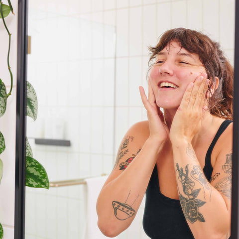 applying shave oil to face